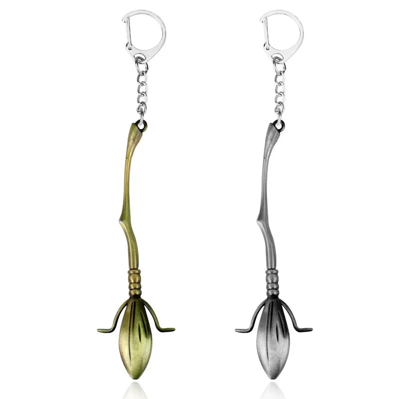 Chaveiro Vassoura Voadora – Emblema da Academia de Magia - Hogwarts™ Express